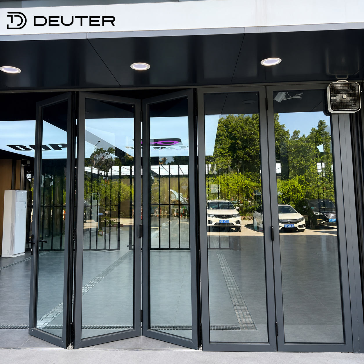 Waterproof Aluminum Accordion Folding Door Thermal Break Storefront Bifold Glass Doors Double Glazed Large Opening Urban Street